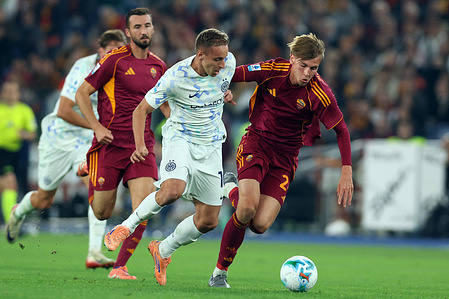 (C) Davide Frattesi of F.C. Inter, and (R) Jan Ziolkowski of Roma seen in action during the Serie A Enilive 2025-2026 football match between AS Roma and F.C. Internazionale of Milan at Olympic Stadium. Final match result: Roma 0-1 Inter