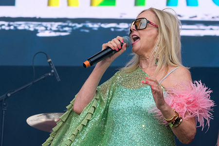 Clare Grogan, Scottish female vocalist and song writer with 1980s New Wave post punk band, Altered Images, performs live on stage at Let's Rock Festival, St Mary's Stadium.