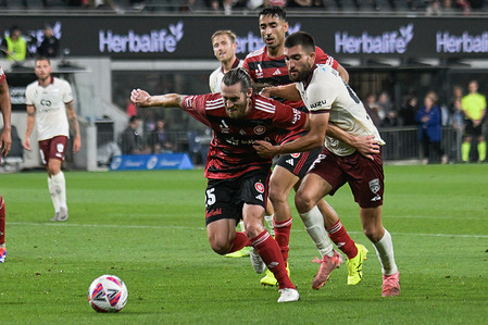Joshua Brillante (L) of Western Sydney Wanderers and Austin Ayoubi (R) of Adelaide United FC seen in action during the 2024-25 Isuzu UTE A-League round 3 match between Western Sydney Wanderers FC and Adelaide United FC at CommBank Stadium, Parramatta. Final score; Western Sydney Wanderers FC 3:4 Adelaide United FC.