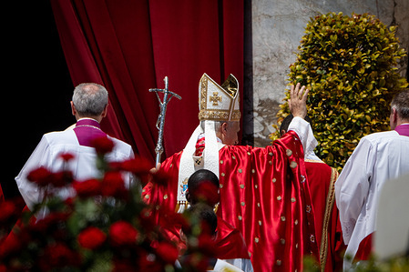 Pope Leo XIV waves as he leaves St. Peter’s Square at the end of the Mass for the Jubilee of New Religious Associations on Pentecost Day.