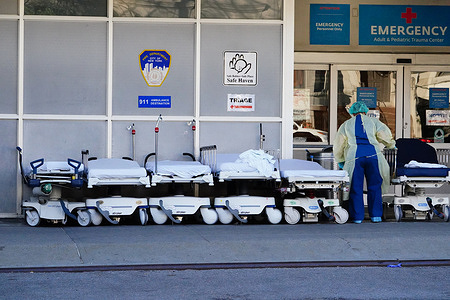 View of a row of empty hospital beds outside the Maimonides Medical Center amid Coronavirus (COVID-19) Crisis.