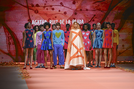 A model walks the runway wearing a design by Agatha Ruiz de la Prada during the Mercedes-Benz Fashion Week de Madrid in IFEMA.