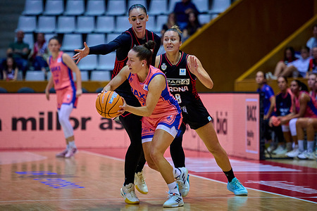 Karolina Sortolova of Baxi Ferrol, Carolina Guerrero and Marta Canella of Spar Girona in action during a match of the Spanish Women's Basketball League, Liga Femenina Endesa, gameday 2 between Spar Girona and Baxi Ferrol at Fontajau Pavilion. Final scores: Spar Girona 93-62 Baxi Ferrol