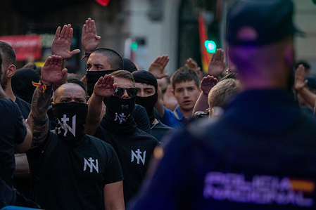 A group of far-right extremists perform a fascist salute during a demonstration. Hundreds of far-right protesters rallied near the headquarters of the Spanish Socialist Workers' Party (PSOE) on Calle Ferraz in Madrid, demanding early presidential elections following the discovery of new corruption cases affecting the party of Pedro Sanchez, the current Spanish Prime Minister.