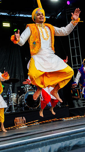 Edmonton dance member in Colours of Punjab perform at K-Days music fest at Edmonton Expo Centre and Fairgrounds.