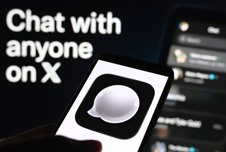 In this photo illustration, XChat logo of the messaging app developed by X Corp.is seen displayed on a smartphone screen.