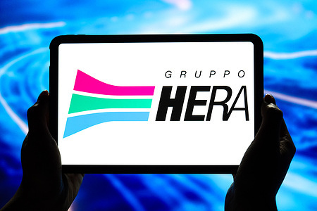 In this photo illustration, the logo of HERA Group is displayed on the screen of a smart tablet.