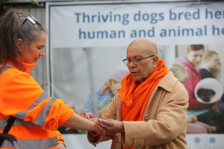 Chief priest Vimala Thero from Letchworth temple blesses walker, Maria Iriart, before they head off to London. Activists from Camp Beagle start their 66 mile walk from Camp Beagle to Parliament Square in London on World Day for Animals in Laboratories. They intend to arrive on Monday 27th April in time for the Parliamentary petition debate calling for 'an end to testing on dogs and other animals for development of products for human use' .The walk aims to raise awareness about the beagles being bred at MBR Acres for toxicology testing.