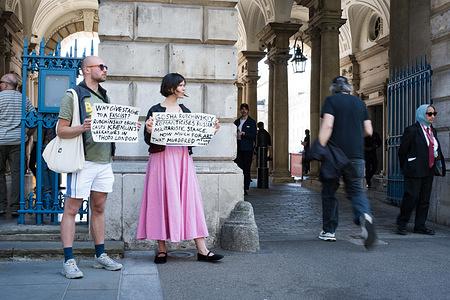 Two protesters against the display of Gosha Rubchinskiy's works at Photo London are seen standing outside the entrance of Somerset House. A group of protesters from Campaign For Ukraine gathered outside Somerset House and demanded Photo London, the annual major photography exhibition, to stop displaying the photography work “Victory Day” by Gosha Rubchinskiy, a Russian designer and photographer whose works are associated with the promotion of Russian nationalism and propaganda.