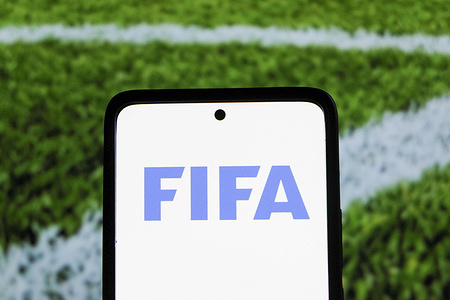 In this photo illustration, the FIFA (International Federation of Association Football) logo is seen displayed on a smartphone screen.