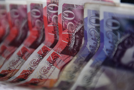 British pounds bank notes are seen in this photo illustration.