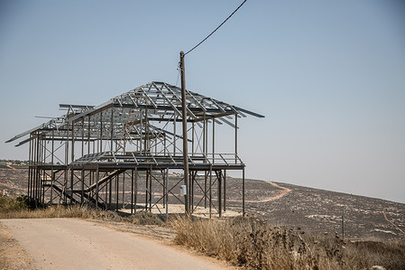 A new construction in the Alumot outpost, an Israeli settlement. More than 700,000 Israeli settlers live between the occupied West Bank and East Jerusalem despite the settlements being considered illegal under international law. Settlers refer to the West Bank as Judea and Samaria and say they have a biblical right to be there.