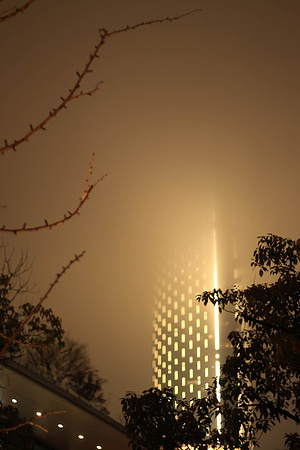 The main tower of "Time Square" district in Suzhou seen through fog at night.
Daily life in Time Square district in Suzhou, China (NOTE : "Time Square" is the English name given to the new economic district and high standing residential area of Suzhou)