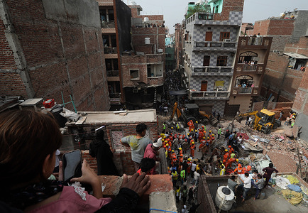 Rescue operation by National Disaster Response Force (NDRF) Delhi Police and locals is underway around the site after a four story building collapsed at Shakti Vihar area in East Delhi, Saturday. Four people were found dead in the debris and several others are injured after the building collapsed in a early hours of Saturday. ​As of now, the specific cause of the building collapse in Shakti Vihar, East Delhi, on April 19, 2025, has not been officially determined. Authorities have initiated an investigation to ascertain the reasons behind the incident. The collapse resulted in multiple fatalities and injuries, prompting rescue operations by the National Disaster Response Force (NDRF), Delhi Police, and local residents.