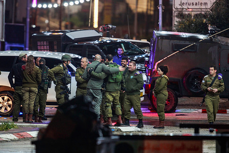 The commander of the Judea and Samaria region in the Israeli army visits and inspects the site of a shooting attack on a Jewish settler's car in the town of Hawara, south of Nablus. A Palestinian carried out a shooting attack on a settler's car while it was in the middle of the market in the town of Hawara.