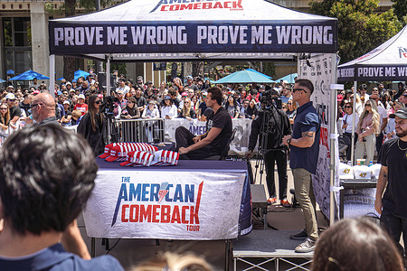 Hundreds of people gather at Town Square in UC San Diego while Charlie Kirk sits in the middle of the plaza. Turning Point USA founder and American conservative political activist, Charlie Kirk sets up in UC San Diego’s Town Square fielding rapid-fire questions from students and community members in a signature “change-my-mind”-style forum, while campus police and private security ring the perimeter to keep the busy plaza orderly.