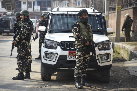 Indian paramilitary troopers stand on guard near the site of a grenade blast in Srinagar.
At least one Indian paramilitary trooper injured after a grenade attack took place outside a police station in Lal bazar area of Srinagar Indian administered Kashmir.