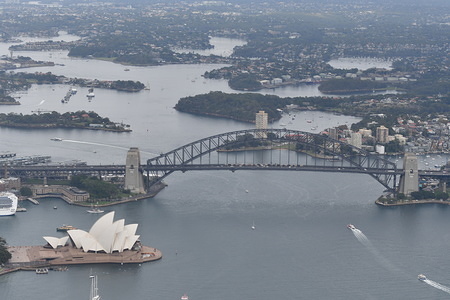 Aerial view of the Sydney Harbour Bridge and the Opera House in Sydney.