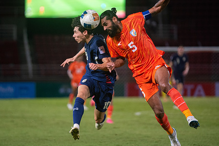 Benjamin James Davis (L) of Thailand and Sandesh Jhingan #5 of India seen in action during the International Exhibition Match between Thailand and India at Thammasat stadium. Final score; Thailand 2 : 0 India.