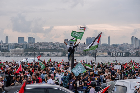 Pro-Palestinian protesters gather during the march. Thousands of people marched to support the Global Sumud Flotilla, which set sail from Italy and Spain to break Israel's blockade of Gaza.