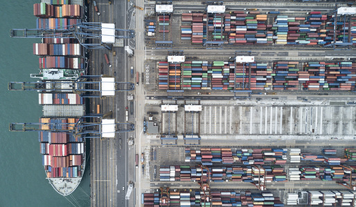 Aerial view of container ship loading at Hong Kong docks.
The Hong Kong Container Terminals is the sixth busiest container port in the world. It handled over 20 million TEUs in 2017.