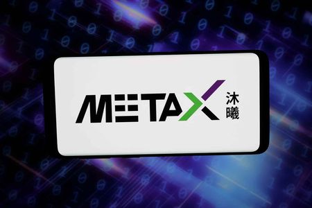 In this photo illustration, the logo of MetaX Integrated Circuits (Shanghai) Co. Ltd. is seen displayed on a smartphone in front of an abstract background on a computer screen.