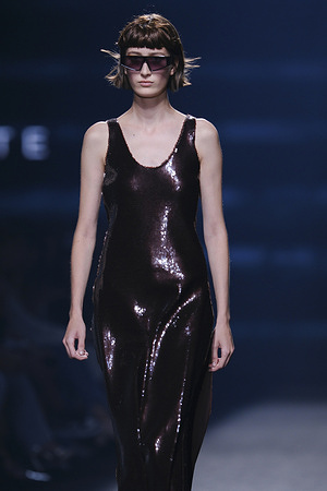 A model walks the runway wearing a creation by Duarte during the presentation of the new collection at Mercedes-Benz Fashion Week Madrid.