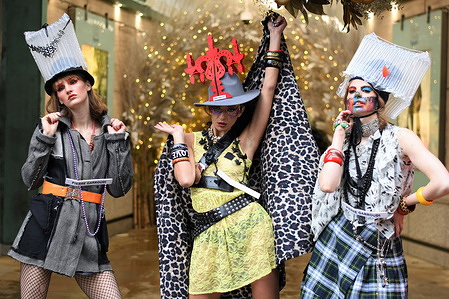 Models showcase Pierre Garroudi latest collection during the flash mob fashion show at Sloane Square.