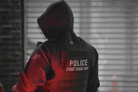 Paterson street crimes officer at the crime scene on Tuesday night. Two weapons recovered and bullets collected by investigators in Paterson, New Jersey, United States on May 2, 2023. Tuesday evening, around 11:00 p.m. Eastern Time police officers engaged in a foot pursuit with a suspect on Governor Street in Paterson, New Jersey. The suspect ran into a residence and officers took him into custody moments later. On the scene, investigators found two weapons and bullets. Crime Scene Investigators tagged the evidence and collected it. The scene was then broken down following the collection and preservation of the evidence. Two weapons recovered and bullets collected by investigators in Paterson. Tuesday evening, around 11:00 p.m. Eastern Time police officers engaged in a foot pursuit with a suspect on Governor Street in Paterson, New Jersey. The suspect ran into a residence and officers took him into custody moments later. On the scene, investigators found two weapons and bullets. Crime Scene Investigators tagged the evidence and collected it. The scene was then broken down following the collection and preservation of the evidence.