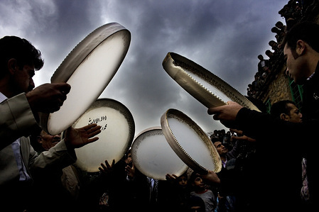 Pilgrims getting ready for the winter ceremony of Aroosi Pir Shahriar where man play Daf Drums and Dervishes dance and deliver speeches on Pir Shahriar's personality. Every year in the Kurdish village of Uraman Takht in west Iran, the locals celebrate the ancient festival of Pir-e Shaliar, also called the “Wedding of Pir-e Shaliar”. This winter celebration include music,with men playing the Daf drums, Daravish dancing and speeches and each year, the festival is greater, with the active participation of locals and pilgrims.