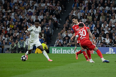 Vinicius Jr. of Real Madrid in action during the second leg of the UEFA Champions League match between Real Madrid and Benfica played at the Santiago Bernabéu Stadium. Final score: Real Madrid 2 - 1 AS Benfica.