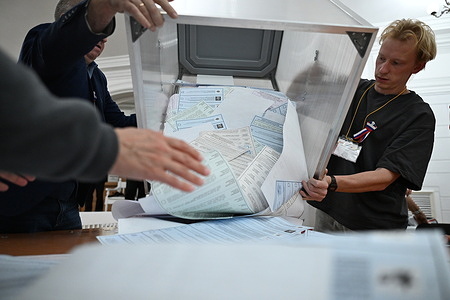 Local election commission preparing to count votes after the final day of voting in the Russian elections in Krasnoyarsk.