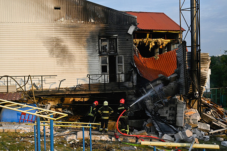 Rescuers extinguish a fire in the destroyed gym of the International Academy of Personnel Management, which suffered from a missile attack by the Russian Army in Kyiv. Russian Army inflicted a missile blow on the capital of Ukraine, Sumy, and Kharkiv region. The air defense forces of Ukraine shot down 9 ballistic and 13 cruise missiles.