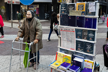 Copies of Chile's new constitution draft are seen at a kiosk in downtown Santiago. Chile votes on September 4 in a referendum on whether to approve or reject the constitutional proposal. The constitutional convention of Chile drafted for a year the new document that is intended to replace the constitution adopted during the dictatorship of Augusto Pinochet (1973-1990).