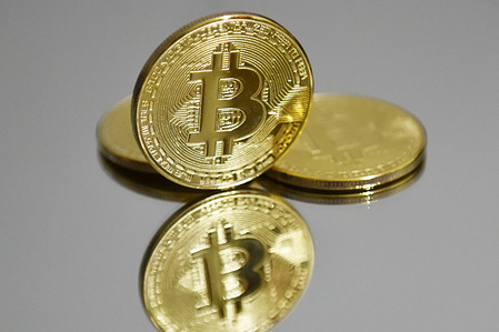 In this photo illustration the Bitcoins are seen on display.