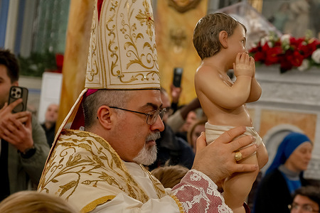 People seen during Christmas Mass at the Holy Spirit Catholic Cathedral, known as the Cathedral of Saint Esprit . Catholics living in Istanbul gathered for Christmas services.