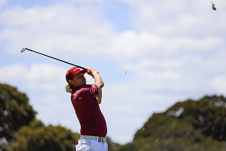 Cameron Smith of Australia plays a shot on the hole in round four of the Australian Open Golf tournament. The 2025 Australian Open concluded with Denmark’s Rasmus Neergaard-Petersen securing the championship at 15-under after a tense final round at The Australian Golf Club. The tournament delivers a dramatic finish, with top international contenders pushing the leaderboard to the final holes. Large crowds gathered across the course as fans watch one of Australia’s premier golf events come to a close for the year.