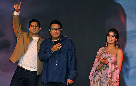 (L-R) Bollywood actor Sidharth Malhotra, film producer Dinesh Vijan and actress Janhvi Kapoor are seen during the music album launch of their upcoming film 'Param Sundari' in Mumbai. The romantic comedy film will release on 29th August 2025.