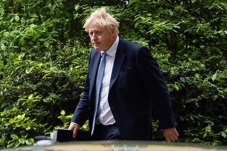Prime Minister Boris Johnson leaves Downing Street after a press conference. The Sue Gray Report into the 'Partygate' scandal was published earlier today, finding that Johnson presided over a culture of lockdown-breaking parties featuring drunken fighting among staff.