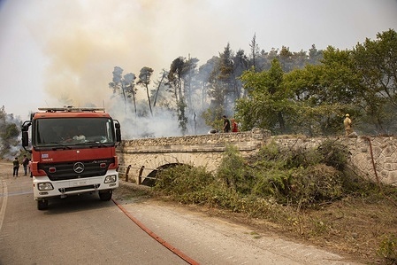 Firefighting truck seen near the fires.
Fire near Kehries village in Evia Island in Greece while firefighters, locals and volunteers try to fight the wildfires, that occurred in the northern part of the Greek island of Evia (Euboea) where fire kept burning almost for 10 days, burning forest and buildings. Almost 100,000 hectares of forest burned in Greek fires according to Copernicus European Emergency Services.