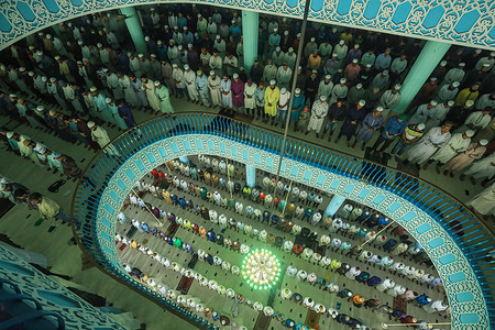 Muslims offer the first Ramadan Friday prayers at Baitul Mukarram National Mosque in Dhaka.