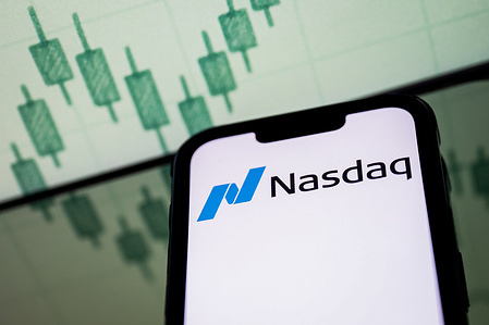 In this photo illustration, a Nasdaq logo seen displayed on a smartphone screen.