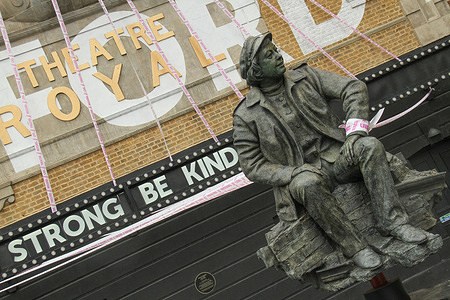 A view of a sculpture of Joan Littlewood, Theatre Director at the Theatre Royal 1914-2002 at The Theatre Royal Stratford East wrapped in bright pink tape during the campaign.
The aim of the campaign is to spread a positive message of hope and visibility to the industry. Some Theatres across the country were wrapped in bright pink tape at the launch of the ‘’Missing Live Theatre’’ campaign by Scene Change, the collective of British Theatre Designers. This follows advice that its 400 team of casual workers would be laid off in a move said unavoidable as the Covid-19 crisis continues to force job losses across the British theatre landscape.