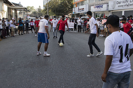 Myanmar National League Football Players playing soccer on the Streets during the protest.
Myanmar National League Football Players took to the streets of Yangon to protest against the military coup and demand the release of Aung San Suu Kyi. Myanmar's military detained State Counsellor of Myanmar Aung San Suu Kyi on February 01, 2021 and declared a state of emergency while seizing the power in the country for a year after losing the election against the National League for Democracy (NLD).
