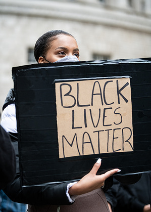 A protester holding a BLM placard during the demonstration.
On a second day of protesting, thousands of people took to the streets of Manchester, in support of the Black Lives Matter movement.