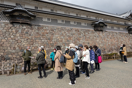 A tour group listens to a guide along the exterior stone wall of Kanazawa Castle Kanazawa Castle is a historic fortress in the heart of Kanazawa, once the seat of the powerful Maeda clan. Though much of it has been reconstructed, its expansive grounds, stone walls, and traditional gates offer a glimpse into Japan’s feudal past.