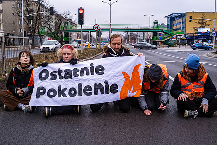 Climate activists block the road with a banner during the rally. The Last Generation (Ostatnie Pokolenie) initiates blockades on a main trunk road in Warsaw, Wislostrada, to protest against the climate policies of Donald Tusk. The blockades on this road have continued for the past 2 weeks and are designed to raise awareness of the climate crisis through sustained, non-violent disruption. The group are demanding that the government shifts 100% of the money allocated for new expressways to regional public transport, and introduces a low-cost, 12.37 USD ticket for public transport throughout Poland. The series of road blocks take place on the week that Polish students return to school. "People must demand change" they state, "otherwise the government will continue to disregard our basic safety."