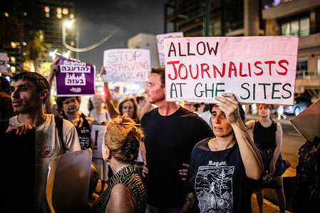 A protestor holds up a placard during a demonstration protesting The Gaza Humanitarian Foundation (G.H.F) activities. After the White House announced last month that it would establish a new plan to distribute aid to Palestinians due to the mounting hunger crisis in Gaza, the State Department indicated on Tuesday that the administration has ultimately decided to suffice with expanding the existing Gaza Humanitarian Foundation delivery system.