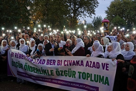 Participants are seen turning on their phone lights during the protest calling for the release of PKK leader Abdullah Ocalan. The expulsion of Abdullah Ocalan, leader of the armed Kurdish organization Kurdistan Workers' Party (PKK), from Syria on October 9, 1988, was protested in the Turkish city of Diyarbakir with a march and press statement organized by the Amed Democratic Institutions Platform. Ocalan was captured in Nairobi, the capital of Kenya, on February 16, 1999, and extradited to Turkey. He has been imprisoned in Turkey for 27 years.