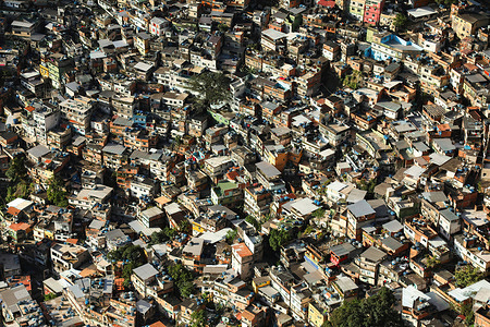 The houses of the Rocinha favela in Rio de Janeiro stretch over several hills. This favela is one of the most densely populated in Brazil. Its population is estimated at over 100,000.